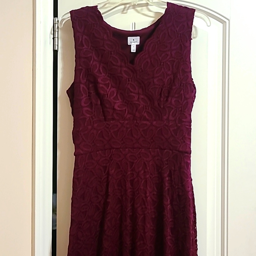 Dressbarn,size 6,burgundy dress with scalloped neckline.  Has side zipper.